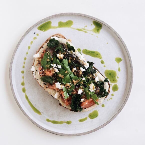 <p>toast with mutabal, tomatoes, feta</p>