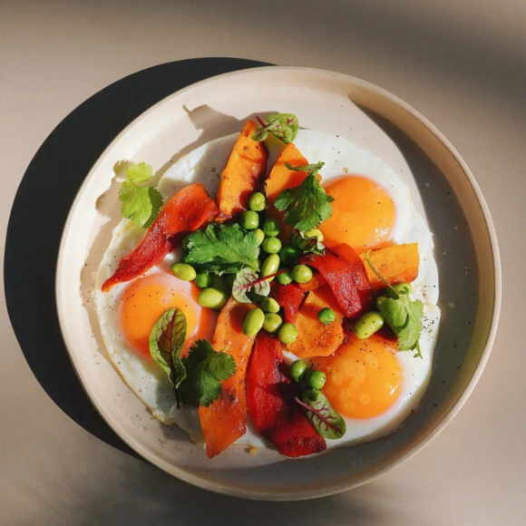 <p>sunny side up eggs, seasonal vegetables</p>